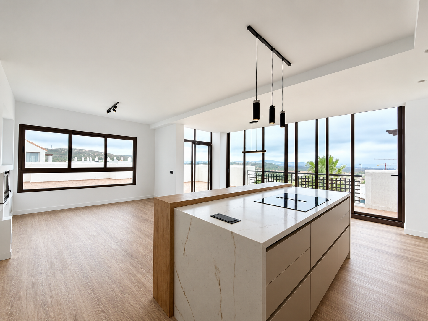 Moderno y luminoso ático de tres dormitorios con vistas abiertas al mar en Acaidesa