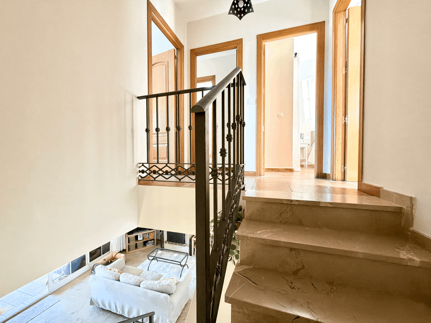 Charming four-bedroom townhouse in a gated community with a swimming pool