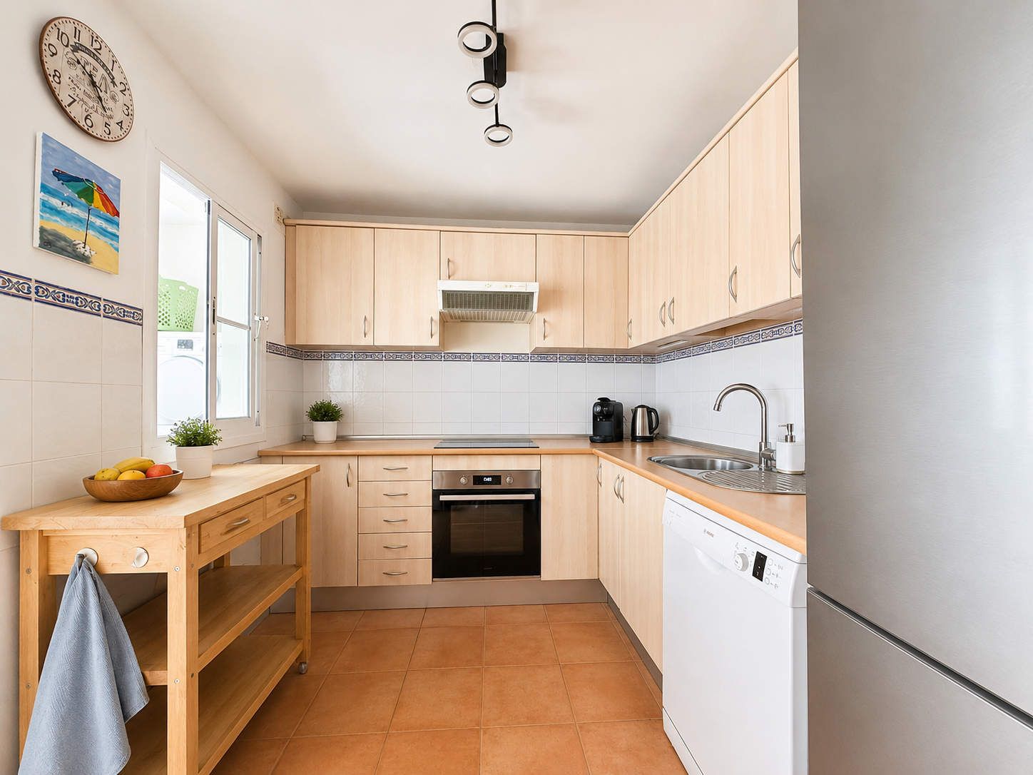 Charming four-bedroom townhouse in a gated community with a swimming pool