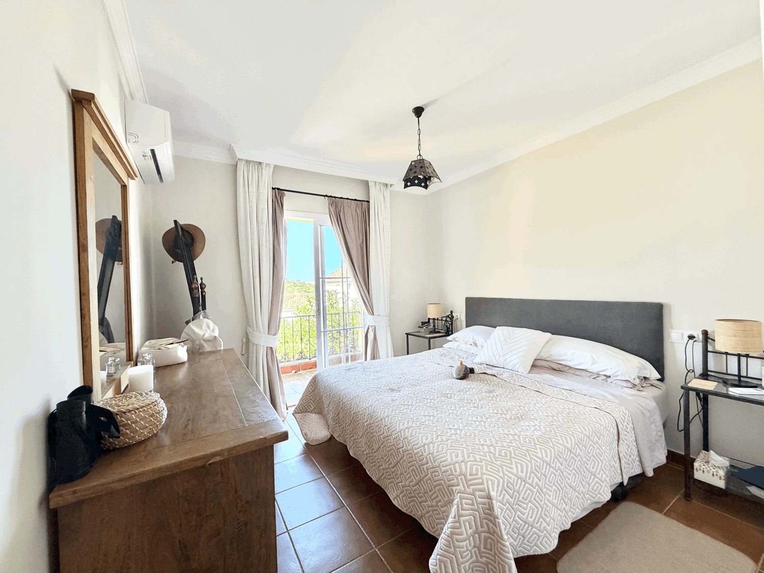 Charming four-bedroom townhouse in a gated community with a swimming pool