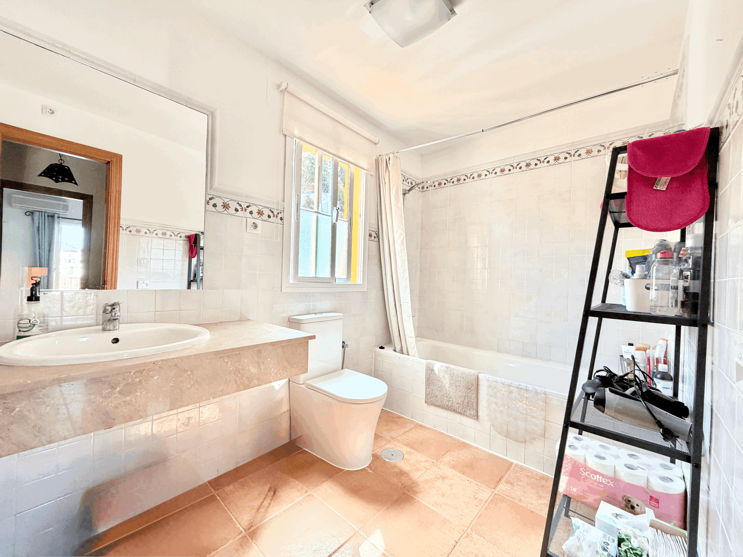 Charming four-bedroom townhouse in a gated community with a swimming pool