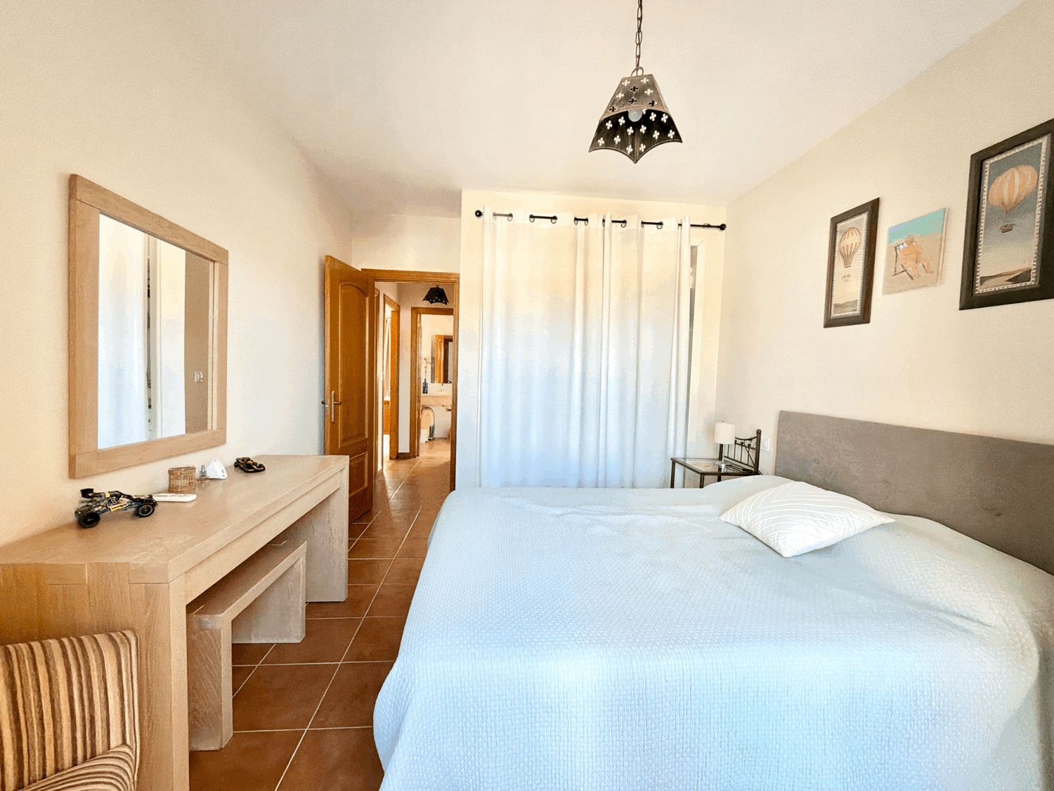 Charming four-bedroom townhouse in a gated community with a swimming pool