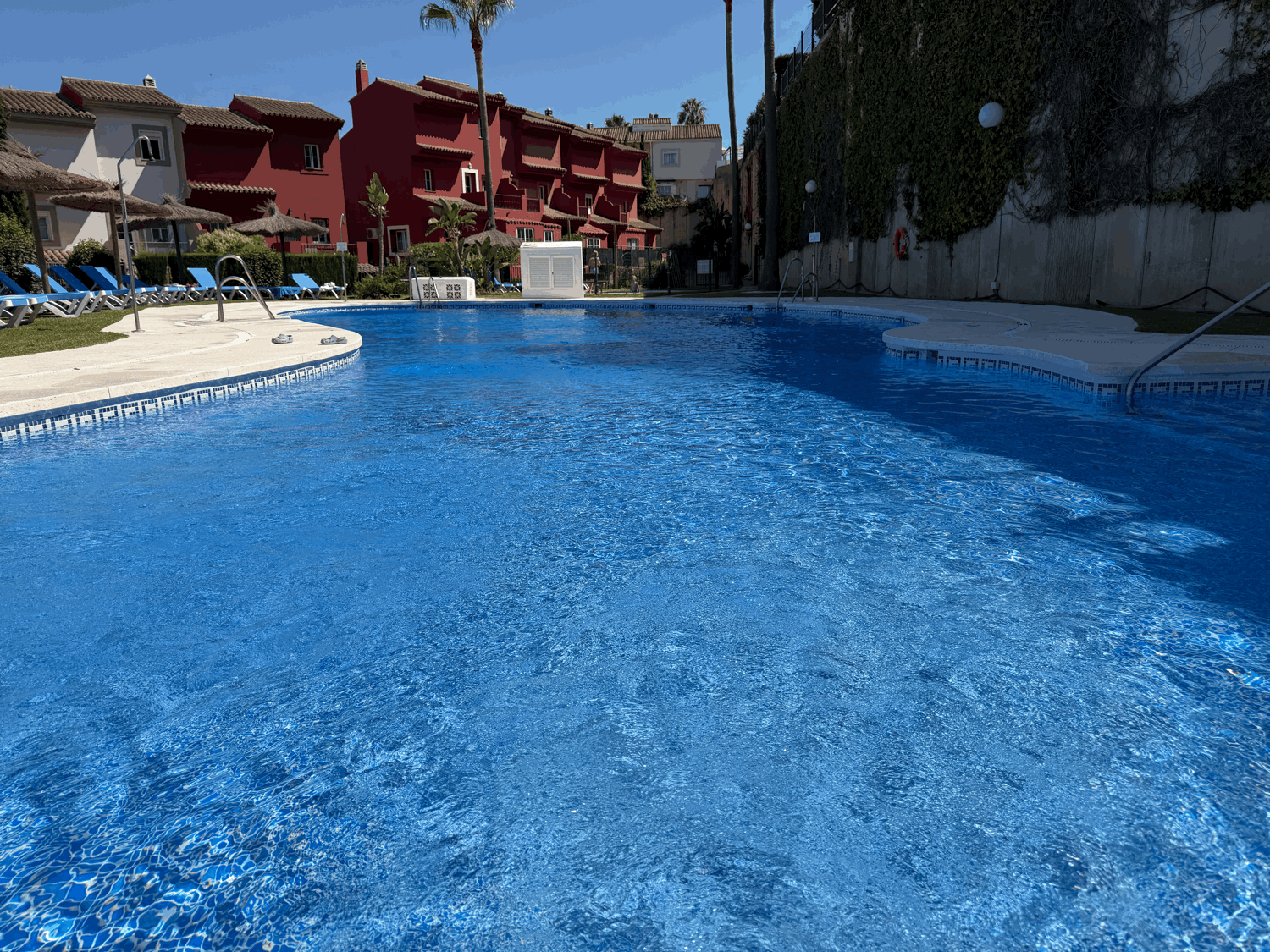 Charming four-bedroom townhouse in a gated community with a swimming pool