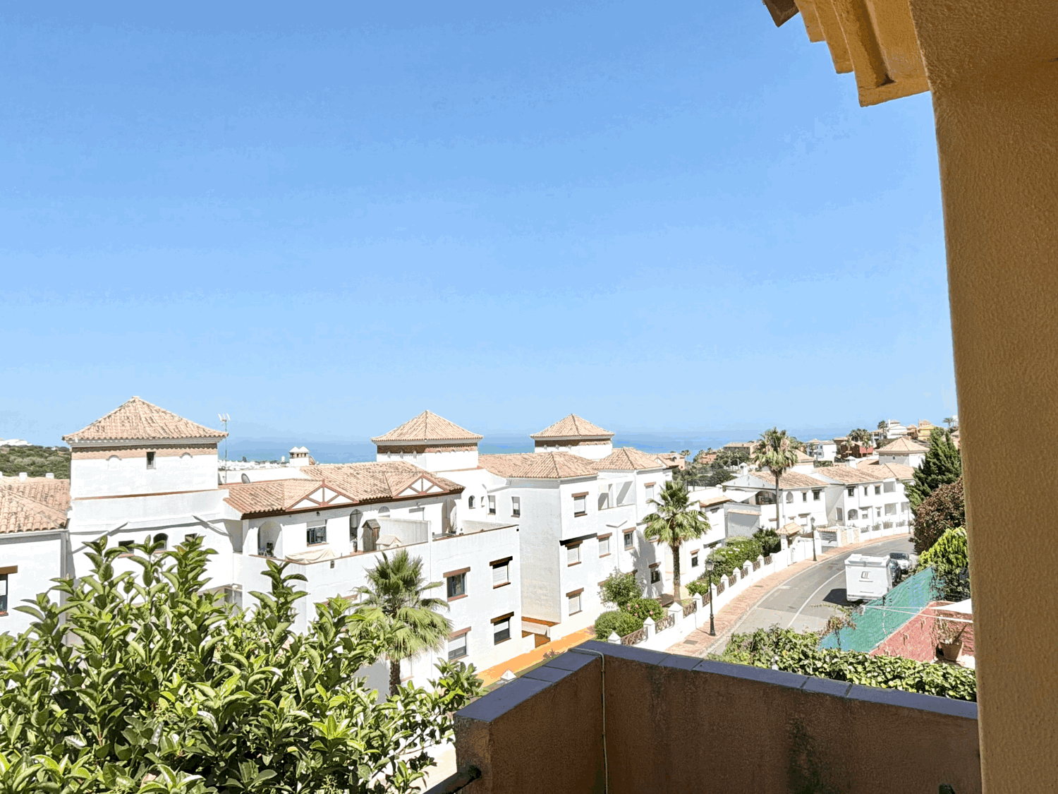 Charming four-bedroom townhouse in a gated community with a swimming pool